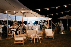 Elegant Christmas table setting inside a Katalane marquee for a private festive celebration